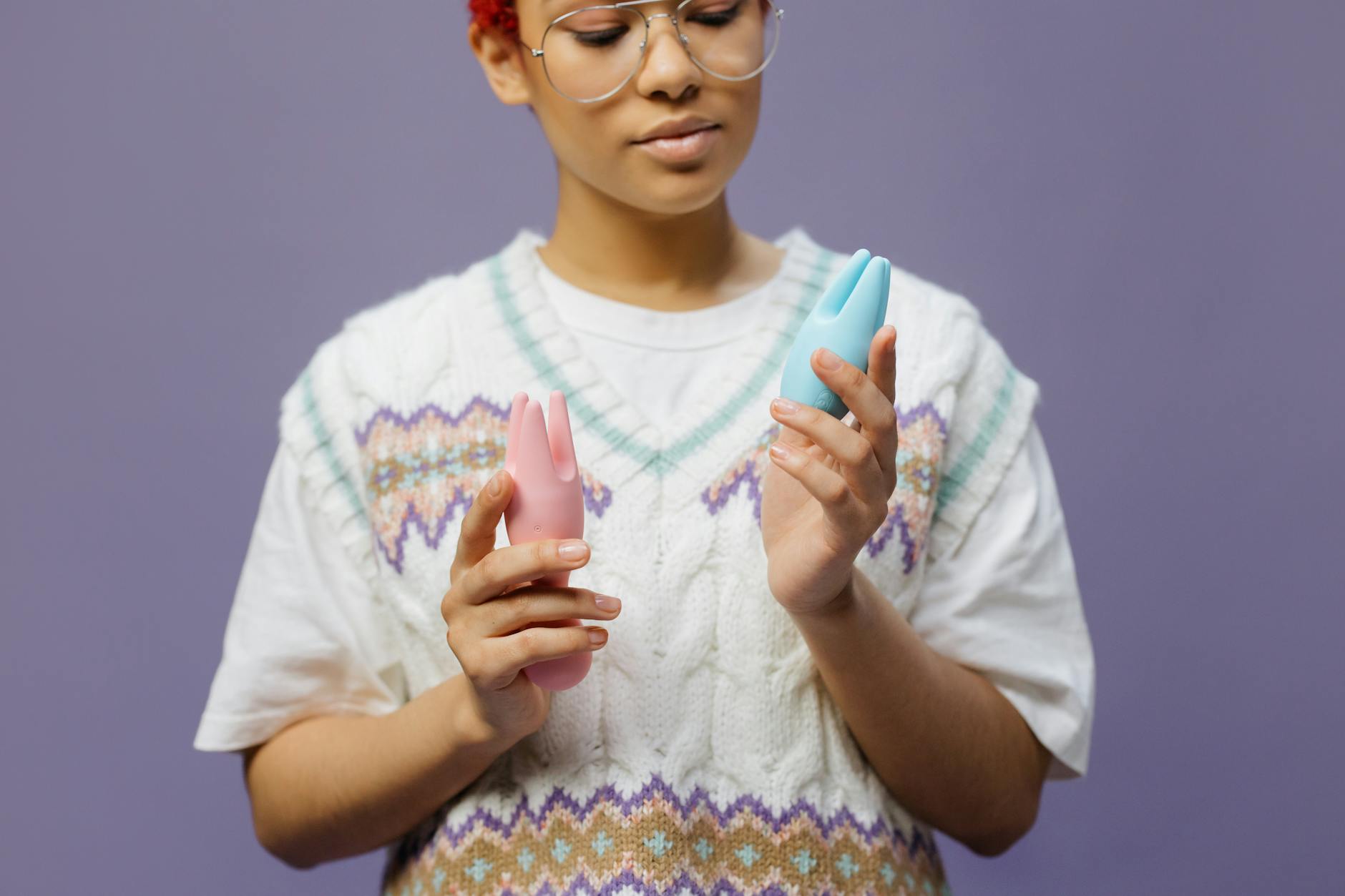 Fresh lemon halves on a pink background in natural light
